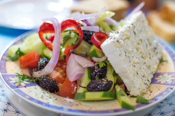 Greek salad with feta cheese and olives