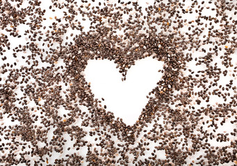 Background of chia seeds with heart shape.