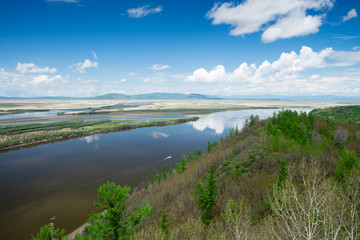 Fototapeta na wymiar Cliff Aury on the Amur River. Khabarovsk region of the Russian Far East. View on the River Amur with Cliff Aury.