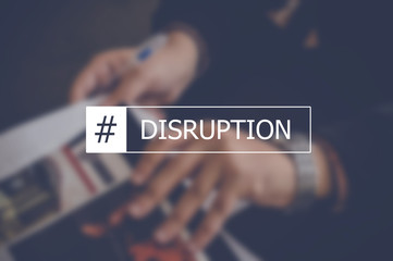 Disruption word with business blurring background