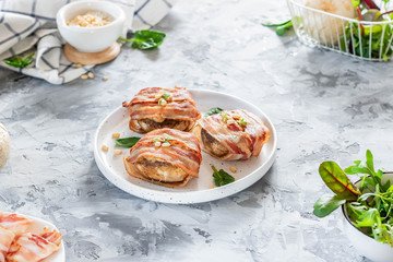Baked mushrooms stuffed with cheese and pine nuts
