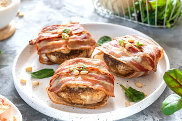 Baked mushrooms stuffed with cheese and pine nuts