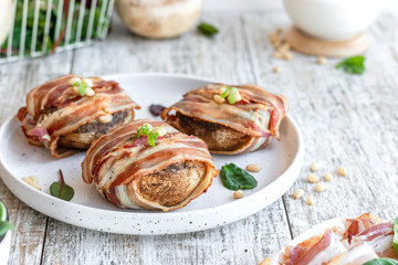 Baked mushrooms stuffed with cheese and pine nuts