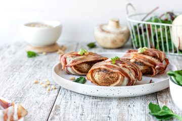 Baked mushrooms stuffed with cheese and pine nuts