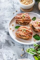 Baked mushrooms stuffed with cheese and pine nuts