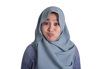 Muslim Woman Blowing or Puffing Cheek