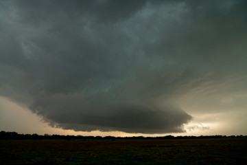 Obraz na płótnie Canvas storm over field
