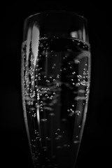 A closeup of champagne flute kept on the table.