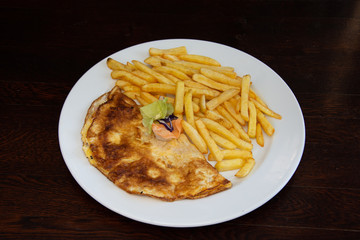 Ham and cheese omelette breakfast and Fried Potatoes