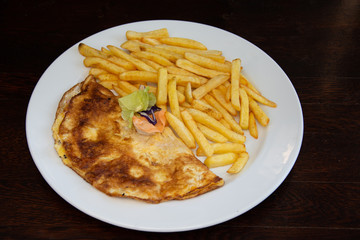 Ham and cheese omelette breakfast and Fried Potatoes