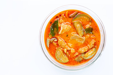 Red curry round eggplant with pork, white background.