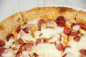 Pizza four friends, with olives and cheese