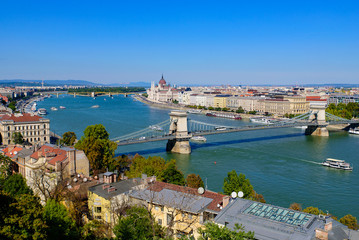 Fototapeta na wymiar Panorama of Hungarian Parliament Building, Széchenyi Chain Bridge, and River Danube in Budapest, Hungary