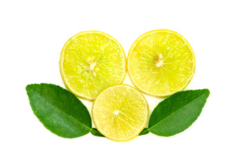 Yellow lemon slice and leaves isolated on white background