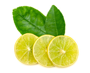 Yellow lemon slice and leaves isolated on white background