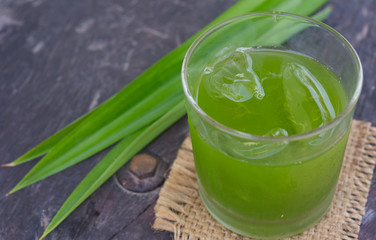 Pandanus  juice with ice cool drink with green leaves.Asia herbel food styed.