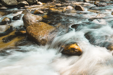 water flowing over rocks