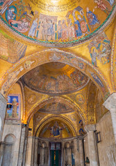 Fototapeta na wymiar Venice, Italy - CIRCA 2013: Mosaic art at the ceiling of St Mark Cathedral (Basilica di San Marco).