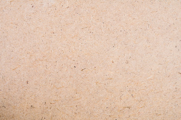 Kraft cardboard texture close-up. Background for text or design
