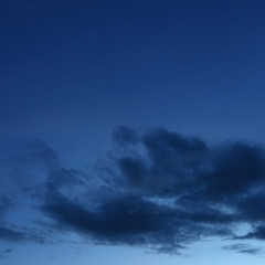 Fototapeta na wymiar black cloud on blue night sky