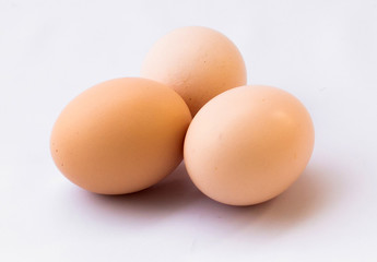 Three eggs on white use for new beginning conception, Happy Easter holidy