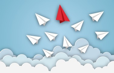 Paper airplanes flying from clouds on blue sky. Leadership, teamwork, motivation, Business, stand out of the crowd concept. paper art design and craft style.