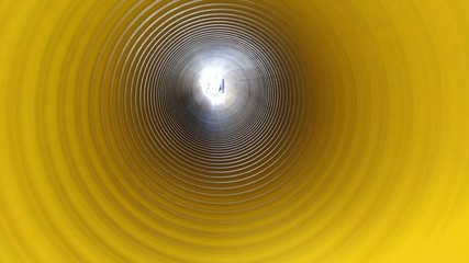 black construction pipes. corrugated pipes coated inside yellow