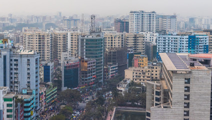 Fototapeta premium Road in the middle of Buildings in Dhaka City