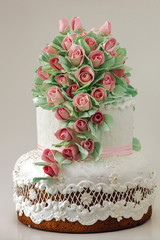 Wedding cake decorated with cream roses