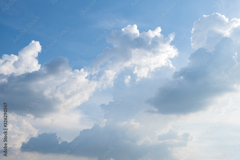 Canvas Prints blue sky background with clouds and sunlight .