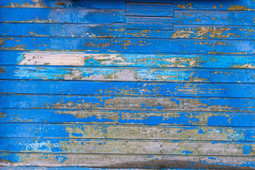 Fototapeta na wymiar Blue wooden texture background. Wall surface. Horizontal wooden boards. Close up with copy space. Old grungy wooden planks background in blue color. Abstract background and texture for design.