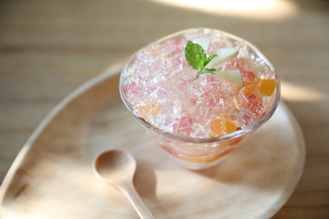 Japanese dessert jelly with fruit on wood plate