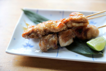 japanese food , Chicken yakitori on wood background