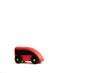 Cute red toy train on a white background