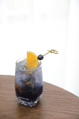 blueberry cocktail soda on the table in white room
