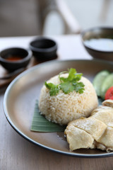 Thai food gourmet steamed chicken with rice , khao mun kai in wood background