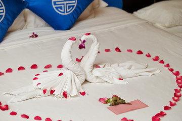 Bedroom decoration, decorated with towel and flower 