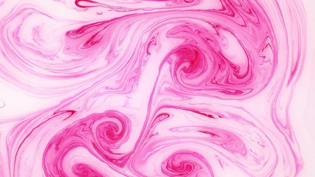 Abstract paint ink in motion. Psychedelic ebru background footage. Flowing colorful spots.