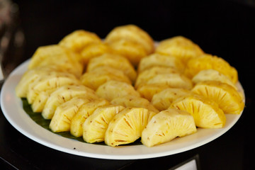 Cut pineapple at hotel buffet 