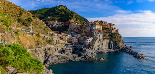 Manarola, one of the five Mediterranean villages in Cinque Terre, Italy, famous for its colorful houses and harbor