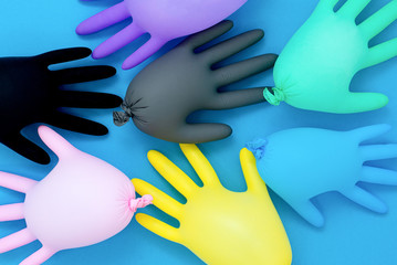 multi-colored medical gloves isolated. Sterile equipment for the medical and beauty industries. Copy space