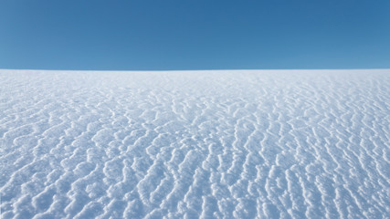Fototapeta na wymiar Snow crust in the tundra
