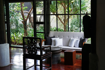 Interior design and decoration of lobby space area at luxury resort hotel and residential area decorated with wooden antique furniture- Chiang mai, Thailand