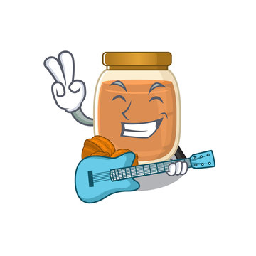 A picture of walnut butter playing a guitar