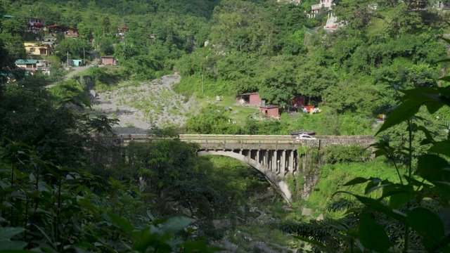 dehradun, uttarakhand / indian - September 25 2019 : vehicle running on india mountains roads towards pilgrims destinations ganotri, badrinath, kedarnath and yamnotri .   