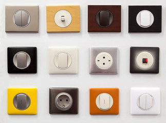 samples of various types and designs of electrical outlets and switches from the manufacturer on...