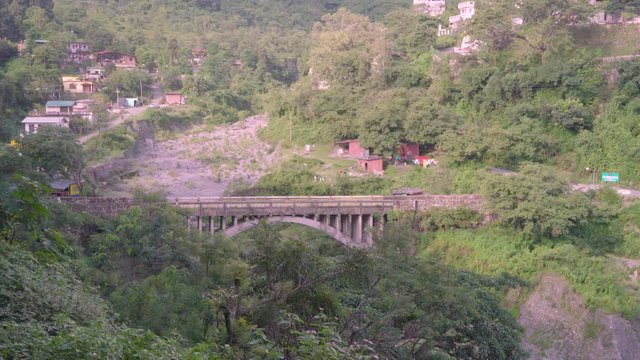 dehradun, uttarakhand / indian - September 25 2019 : vehicle running on india mountains roads towards pilgrims destinations ganotri, badrinath, kedarnath and yamnotri .   