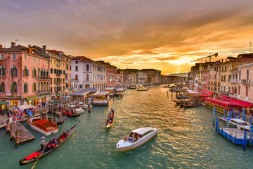 The Grand Canal with gondola and vaporetto at sunset time, Venice, Italy - obrazy, fototapety, plakaty