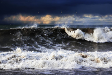 Storm on Black sea. Powerful splashing waves. Dramatic sky