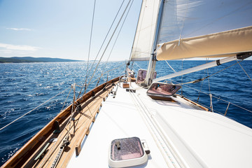 Fototapeta na wymiar yacht bow in Mediterranean sea in the middle of the sunny summer day
